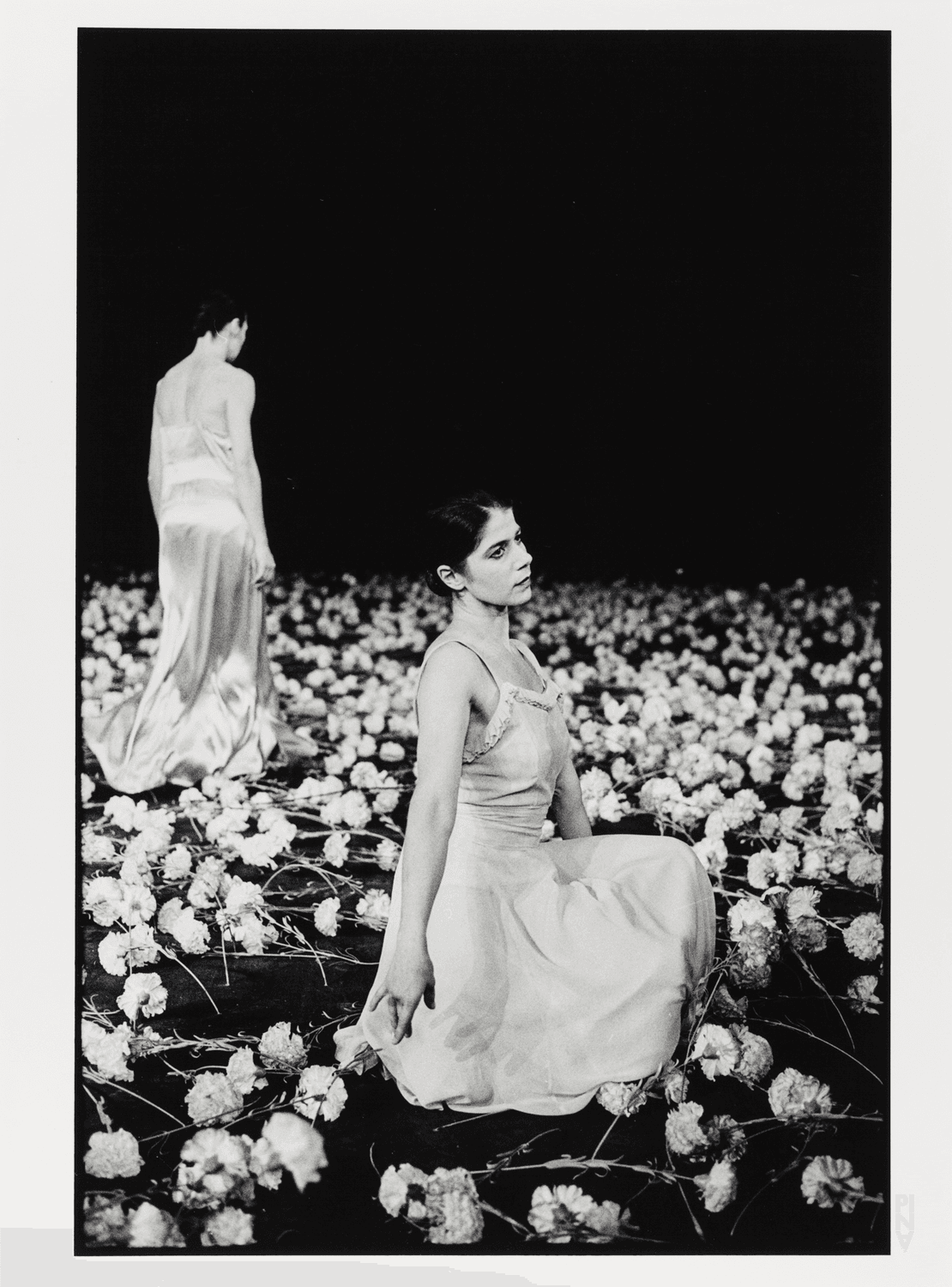 Bénédicte Billiet and Anne Marie Benati in “Nelken (Carnations)” by Pina Bausch