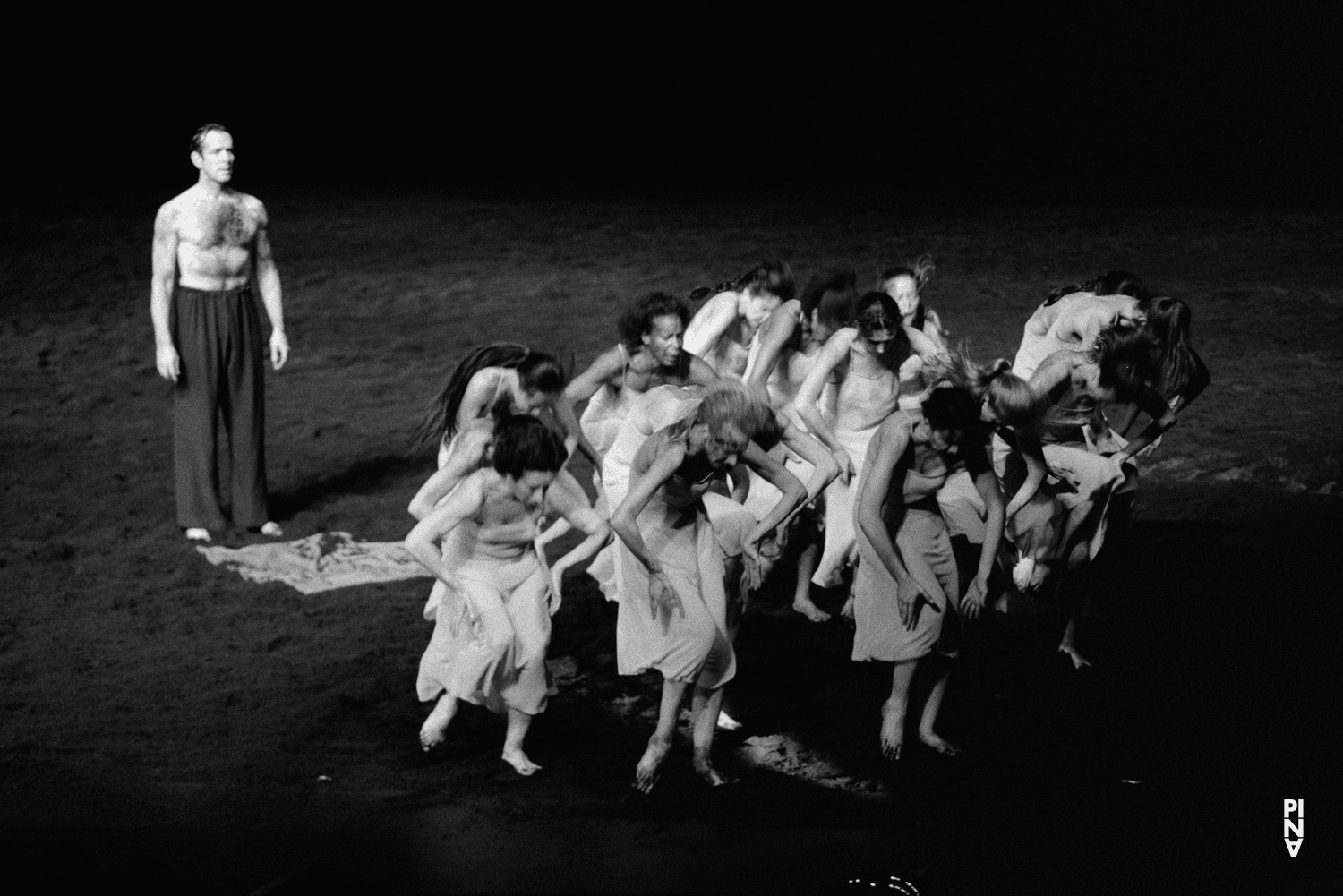 Quincella Swyningan, Urs Kaufmann and Julie Shanahan in “The Rite of Spring” by Pina Bausch at Koninklijk Theater Carré Amsterdam, season 1994/95