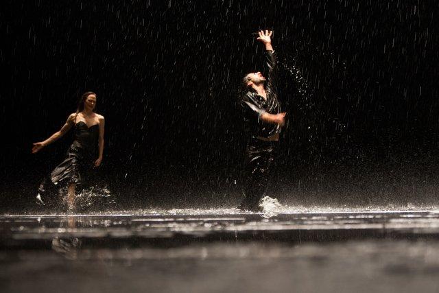 Damiano Ottavio Bigi and Julie Anne Stanzak in “Vollmond (Full Moon)” by Pina Bausch with Tanztheater Wuppertal at Opernhaus Wuppertal (Germany), June 12, 2015
