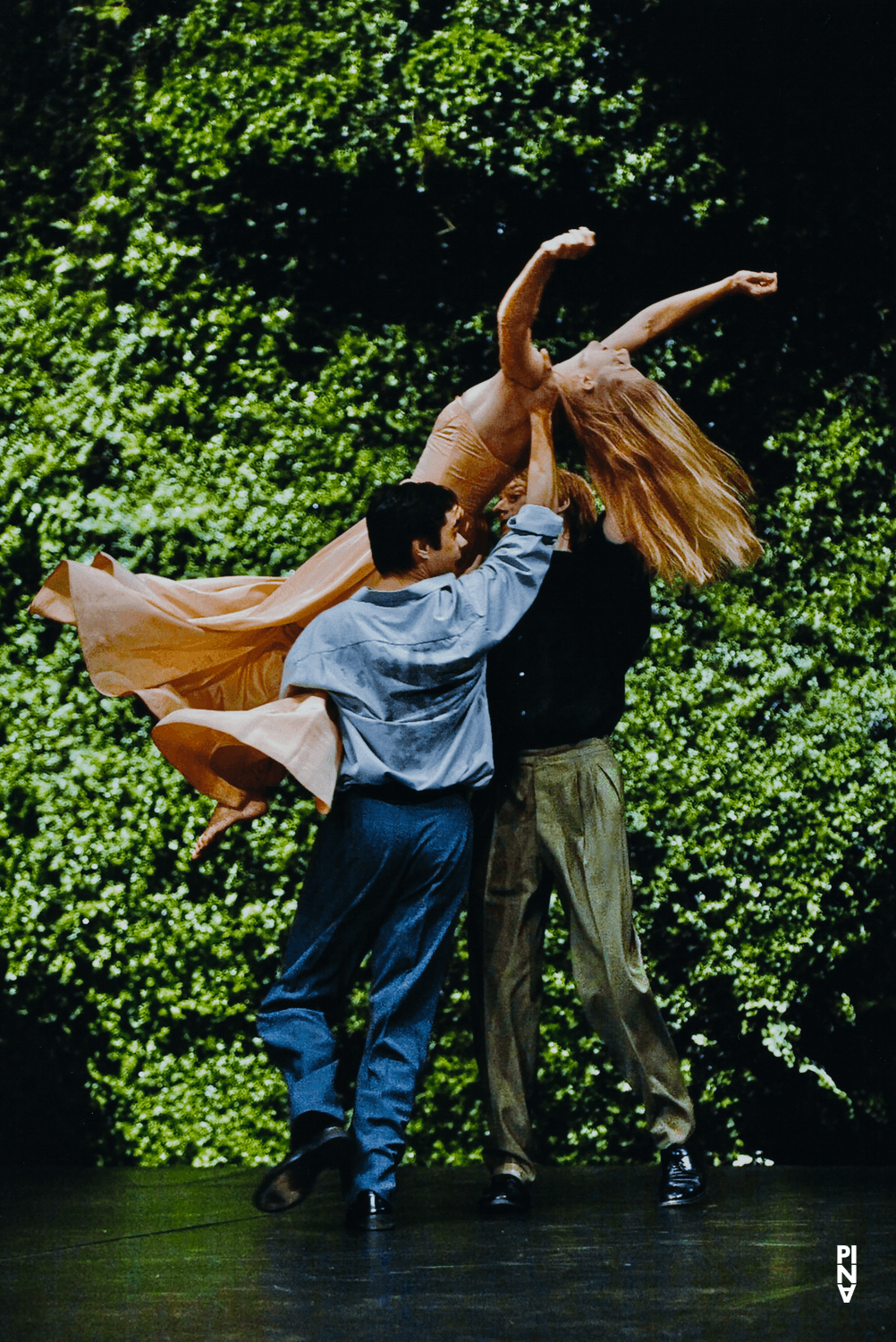 Kenji Takagi, Michael Strecker and Barbara Kaufmann in “Wiesenland” by Pina Bausch