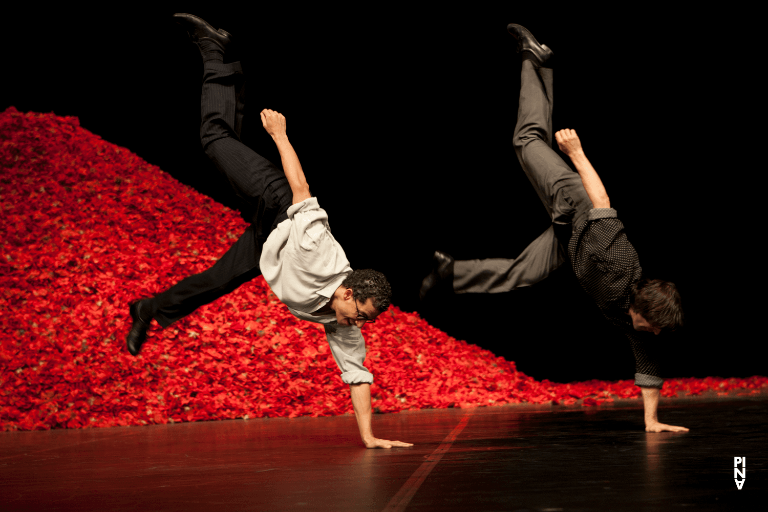 Fernando Suels Mendoza and Rainer Behr in “Der Fensterputzer (The Window Washer)” by Pina Bausch with Tanztheater Wuppertal at Opernhaus Wuppertal (Germany), Nov. 3, 2011