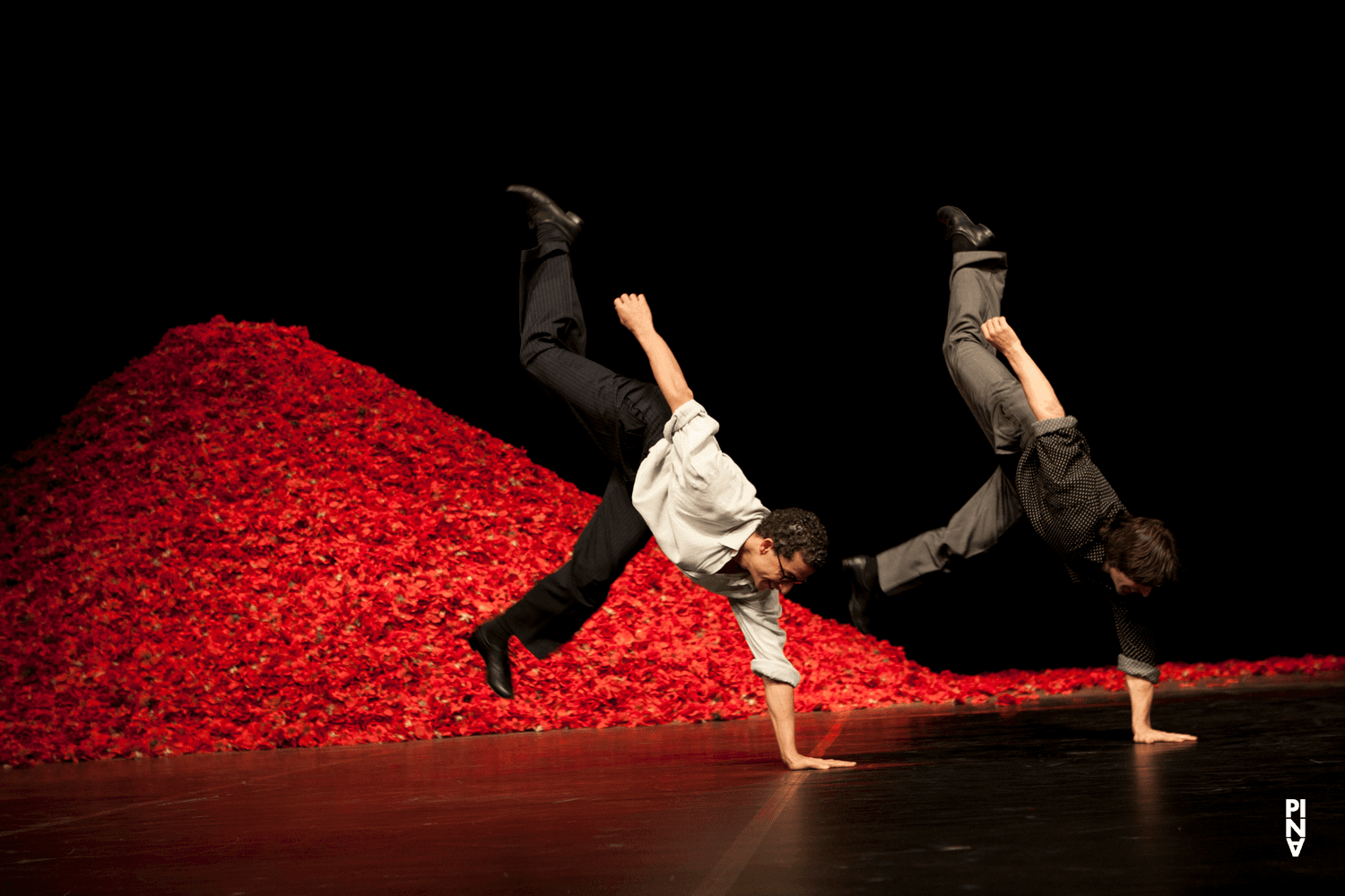 Fernando Suels Mendoza and Rainer Behr in “Der Fensterputzer (The Window Washer)” by Pina Bausch with Tanztheater Wuppertal at Opernhaus Wuppertal (Germany), Nov. 3, 2011