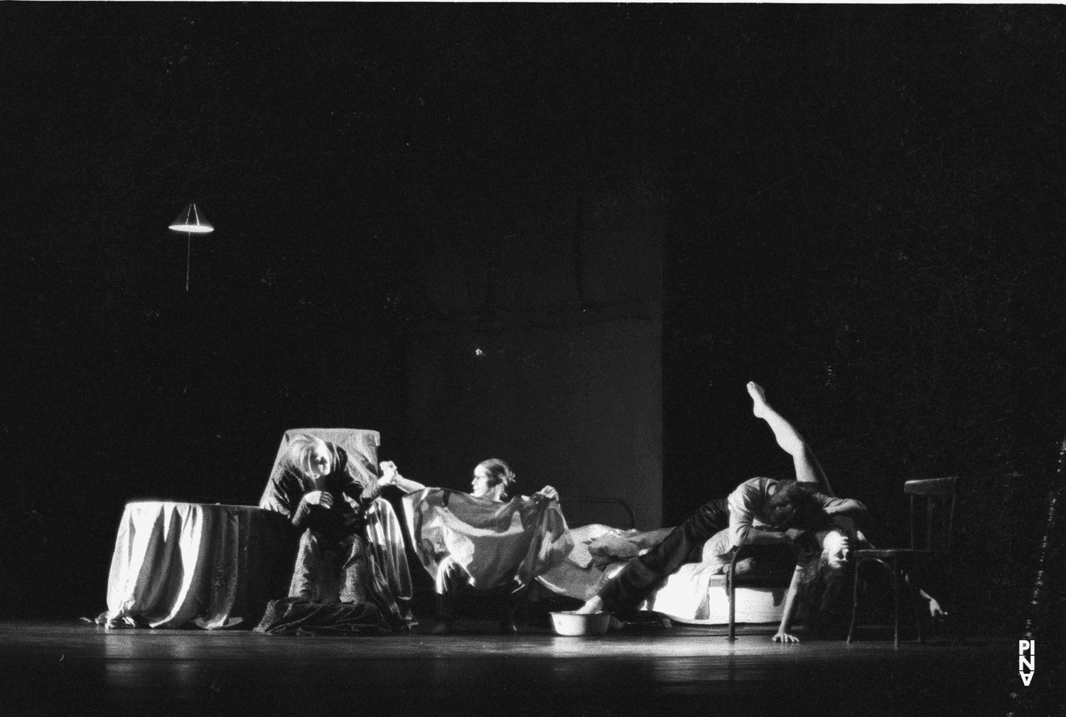 Charlotte Butler, Jan Minařík and Malou Airaudo in “Fritz” by Pina Bausch at Opernhaus Wuppertal