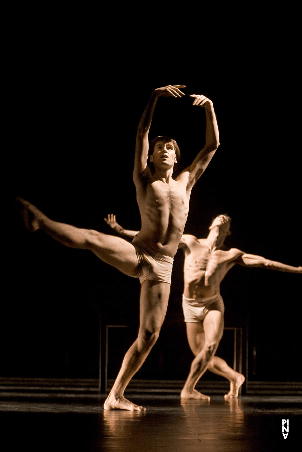 Pablo Aran Gimeno and Fernando Suels Mendoza in “Iphigenie auf Tauris” by Pina Bausch with Tanztheater Wuppertal at Opernhaus Wuppertal (Germany), Jan. 28, 2010